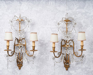 SOLD A stylish pair of Chinoiserie inspired twin branch gilt bronze and crystal wall chandeliers, French Circa 1920