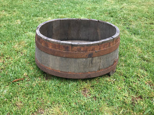 SOLD An oval coopered oak and metal banded harvesting vessel, French 19th Century