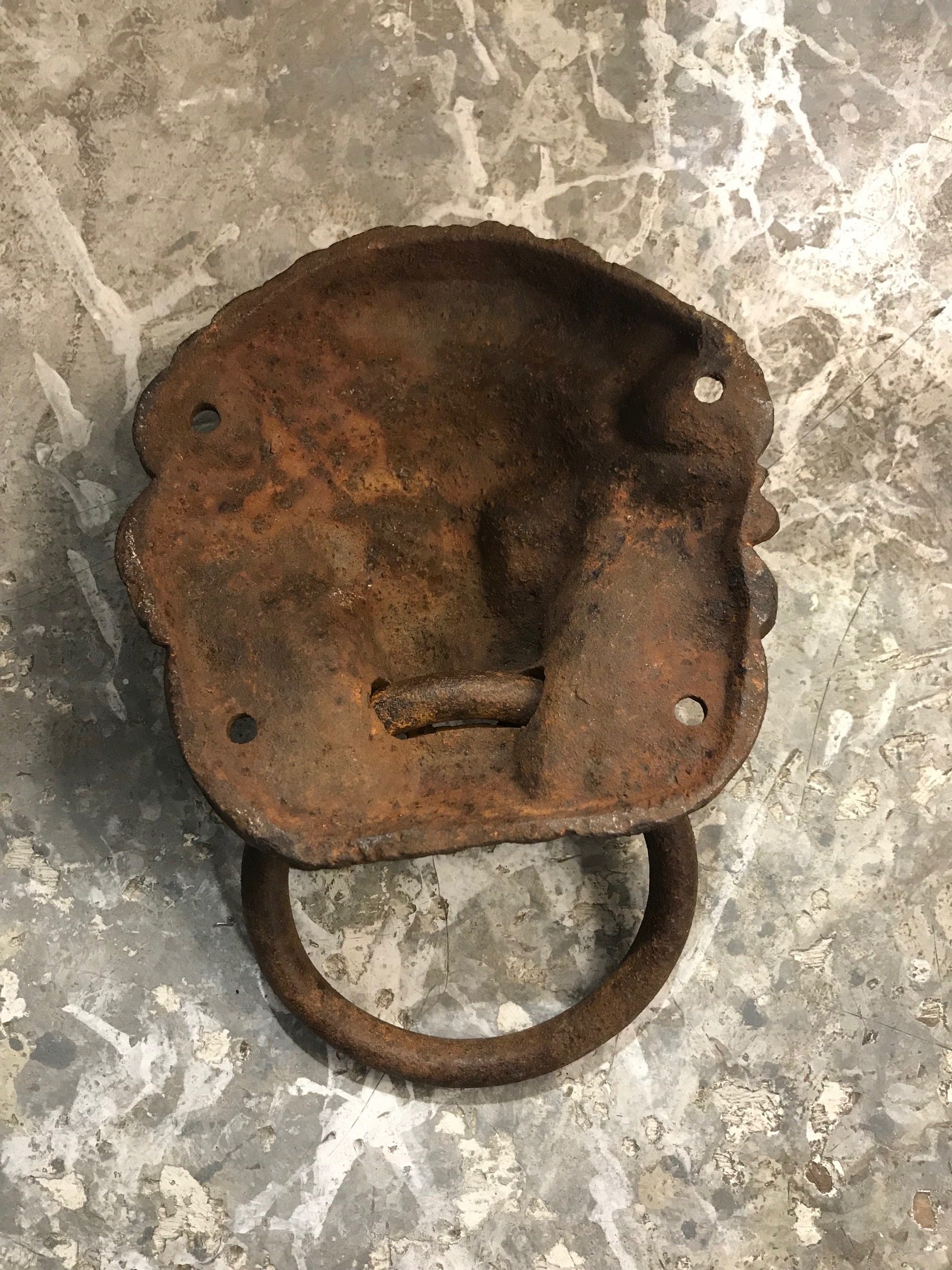 SOLD A cast iron lion mask and ring design door-knocker, French 19th Century