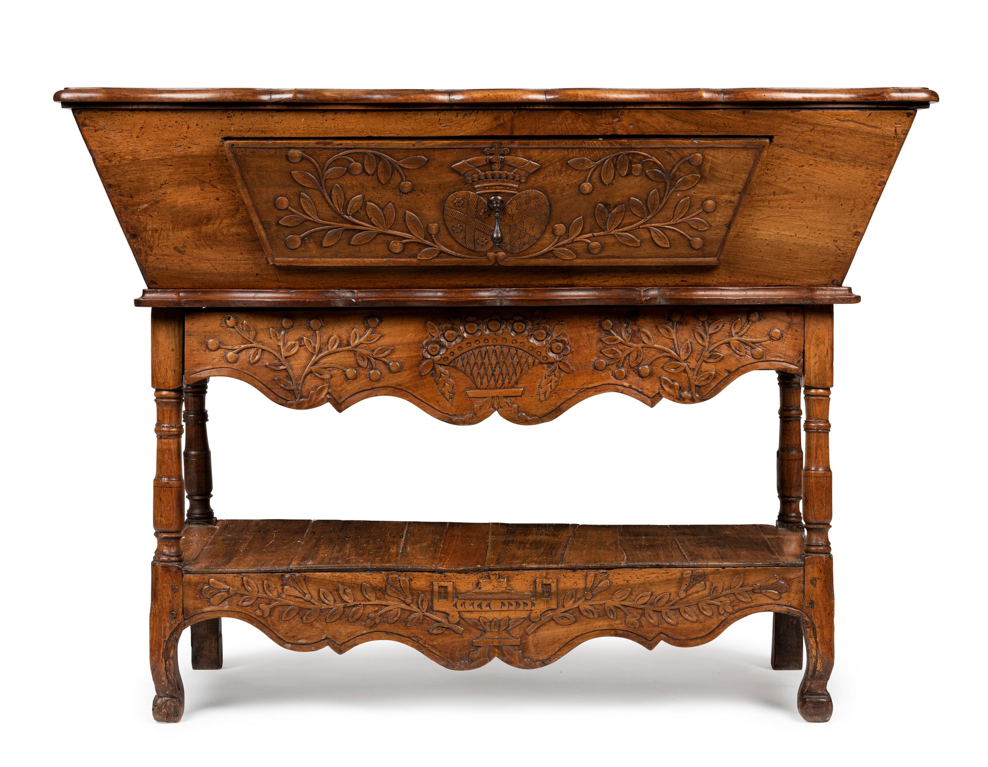 SOLD A beautifully carved walnut and fruitwood dough bin, French 18th Century