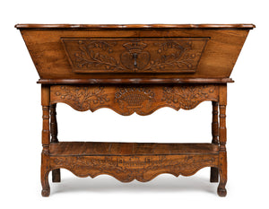 SOLD A beautifully carved walnut and fruitwood dough bin, French 18th Century