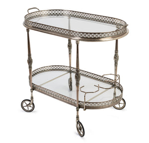 SOLD A fine quality silvered metal and glass two tier-oval drinks trolley,
