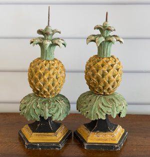 SOLD A pair of Italian decorative polychrome painted carved pineapple form candlesticks