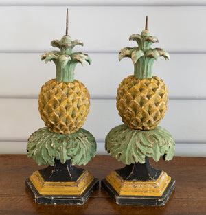 SOLD A pair of Italian decorative polychrome painted carved pineapple form candlesticks