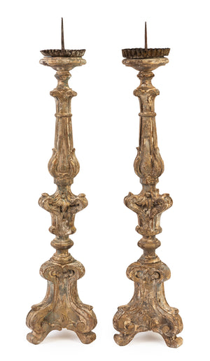 SOLD A pair of giltwood torchere candlesticks, Italian 18/19th Century