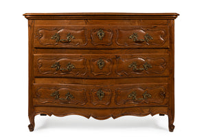SOLD A large three drawer oak commode, French 19th Century