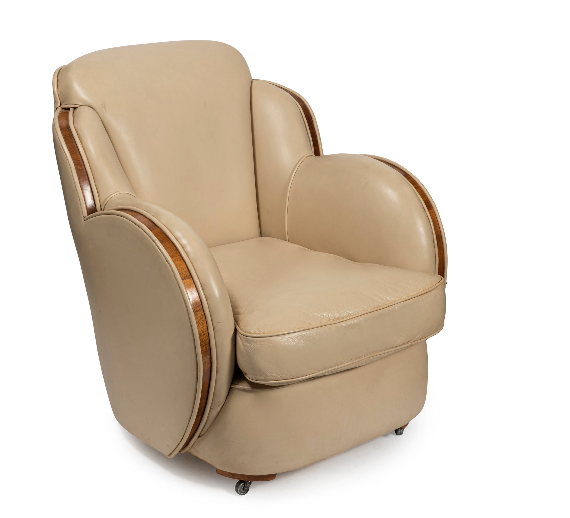 SOLD A cream leather and walnut Art-Deco Cloud Design single armchair, French Circa 1930