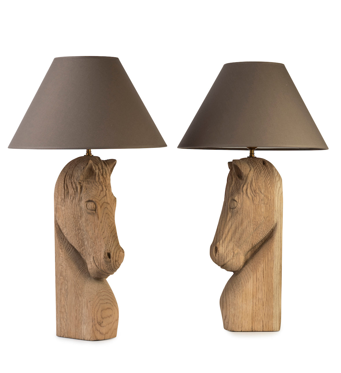 SOLD A pair of unusual carved French natural oak stylized horse-head form table lamps