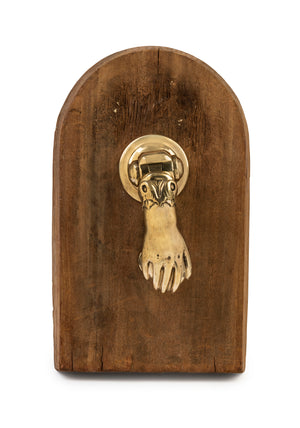 SOLD An impressive polished brass door knocker in the form of a hand, French 19th Century