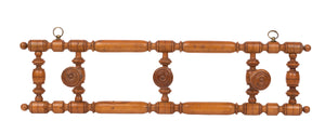 SOLD A carved fruitwood hanging coat and hat rack French, 19th Century