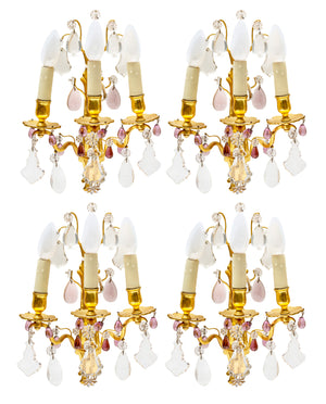 SOLD A stylish set of four gilt bronze and crystal three torch wall lights, French Circa 1940