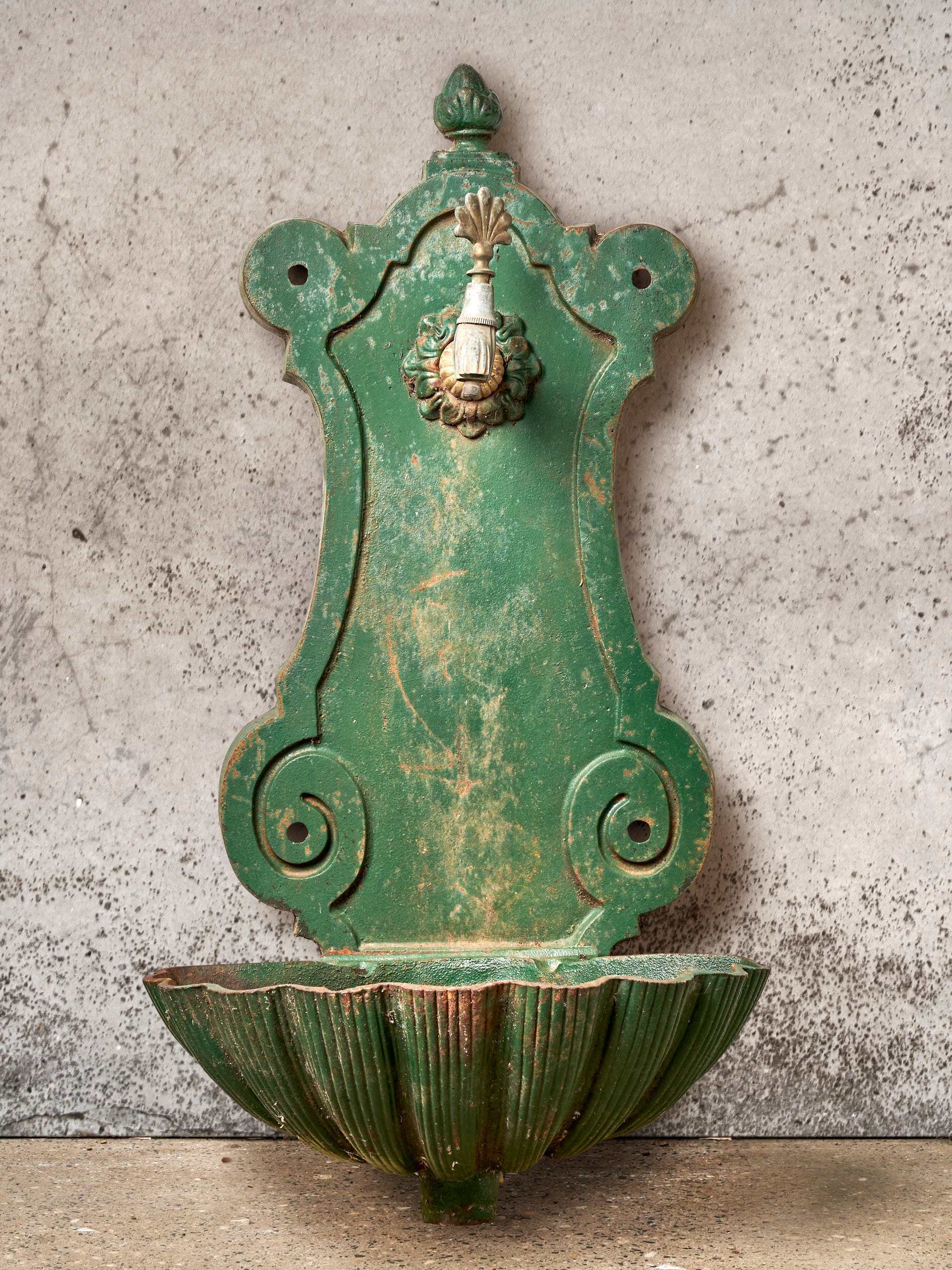 SOLD A French vintage solid green painted cast iron wall font, with shell basin design