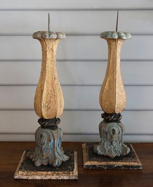SOLD A pair of grand Italian polychrome painted and carved foliate design torchere candlesticks