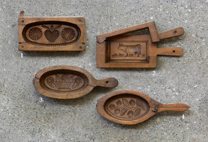 SOLD A collection of hand carved wooden butter moulds, French 19th Century