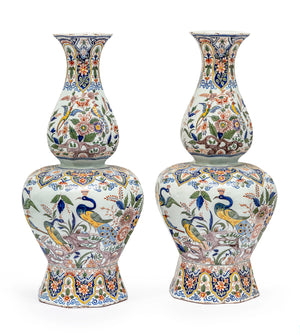 SOLD An exceptional pair of very large faience Persian baluster shaped peacock and floral decorated vases, signed, French 19th century